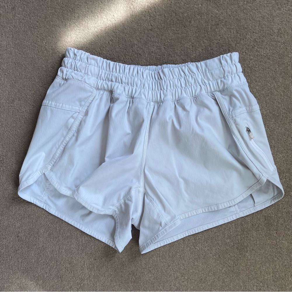 Lululemon women half white greyish lined brief running shorts. Size 6. Used.